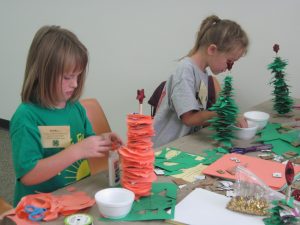 shelby-and-siobhan-creating-their-paper-christmas-tree